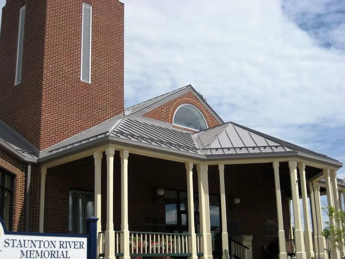 Skilled roofing craftsmen working on a residential roof in Pittsburgh